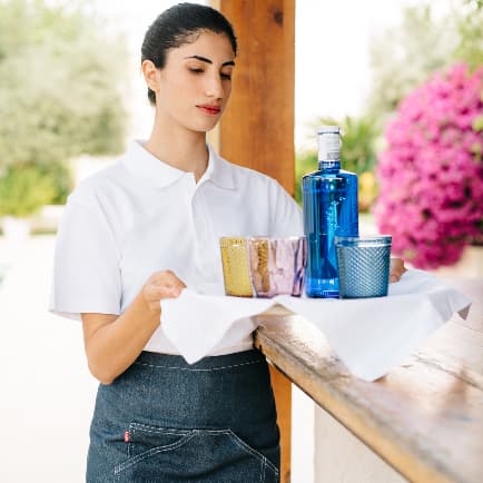 El incremento del turismo en España para este verano dispara la demanda de textil laboral en hostelería